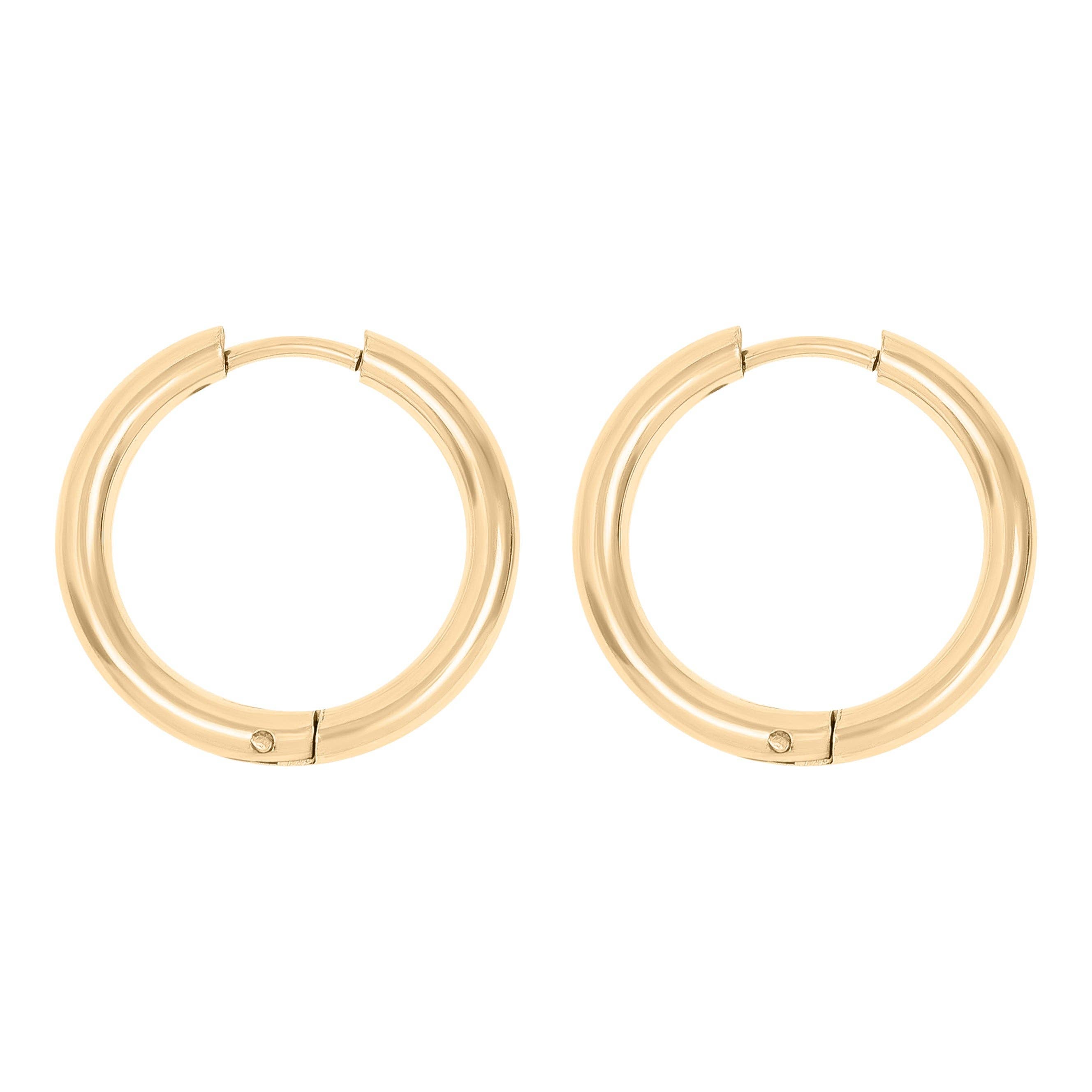 Gold hoop earrings on a white background