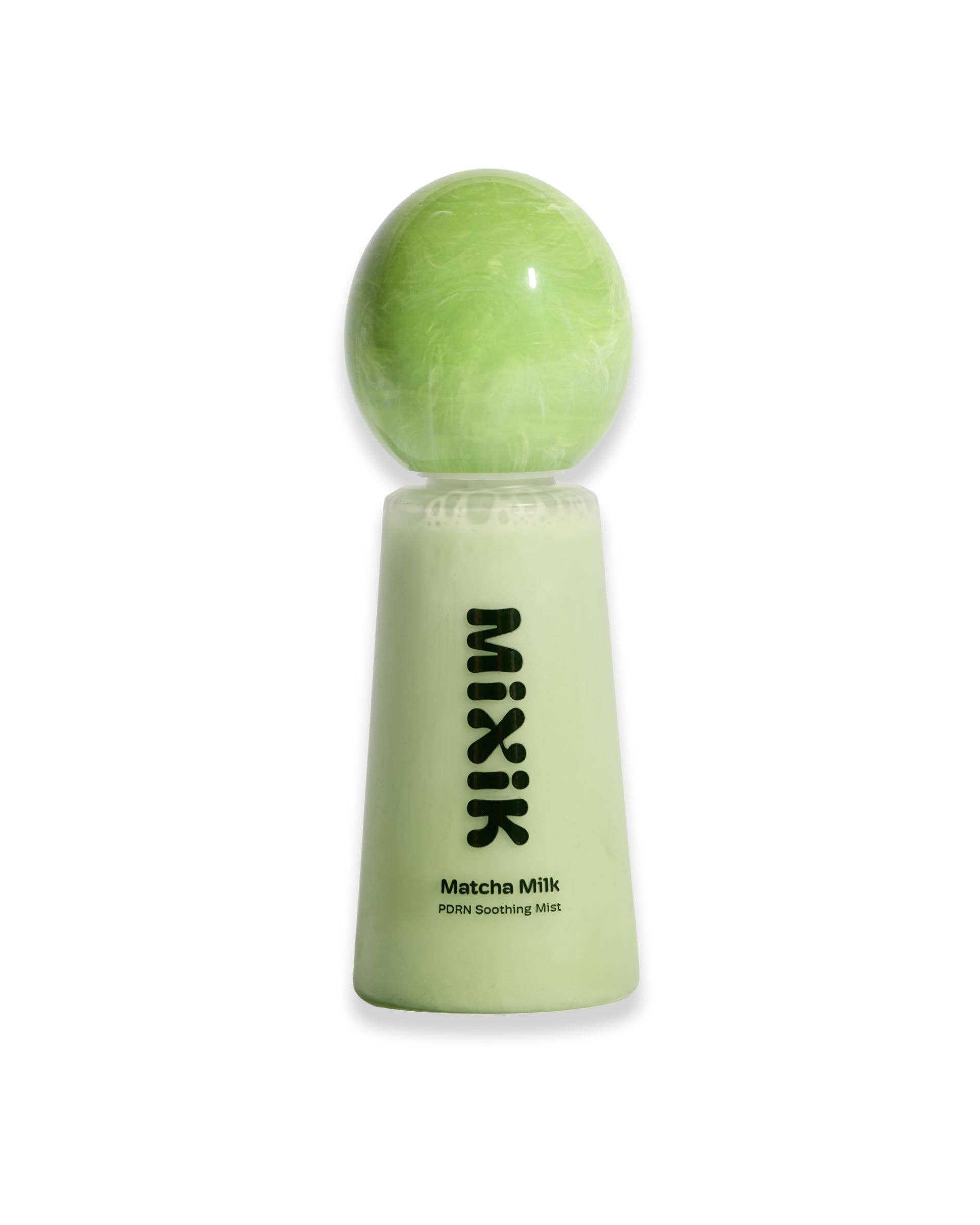 Green bottle labeled 'Mixik' with a spherical green object on a white background