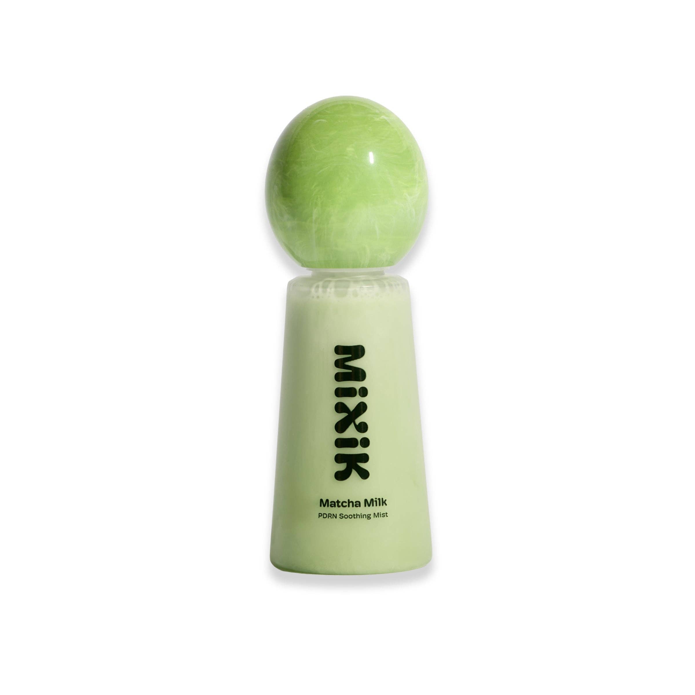 Green bottle labeled 'Mixik' with a spherical green object on a white background
