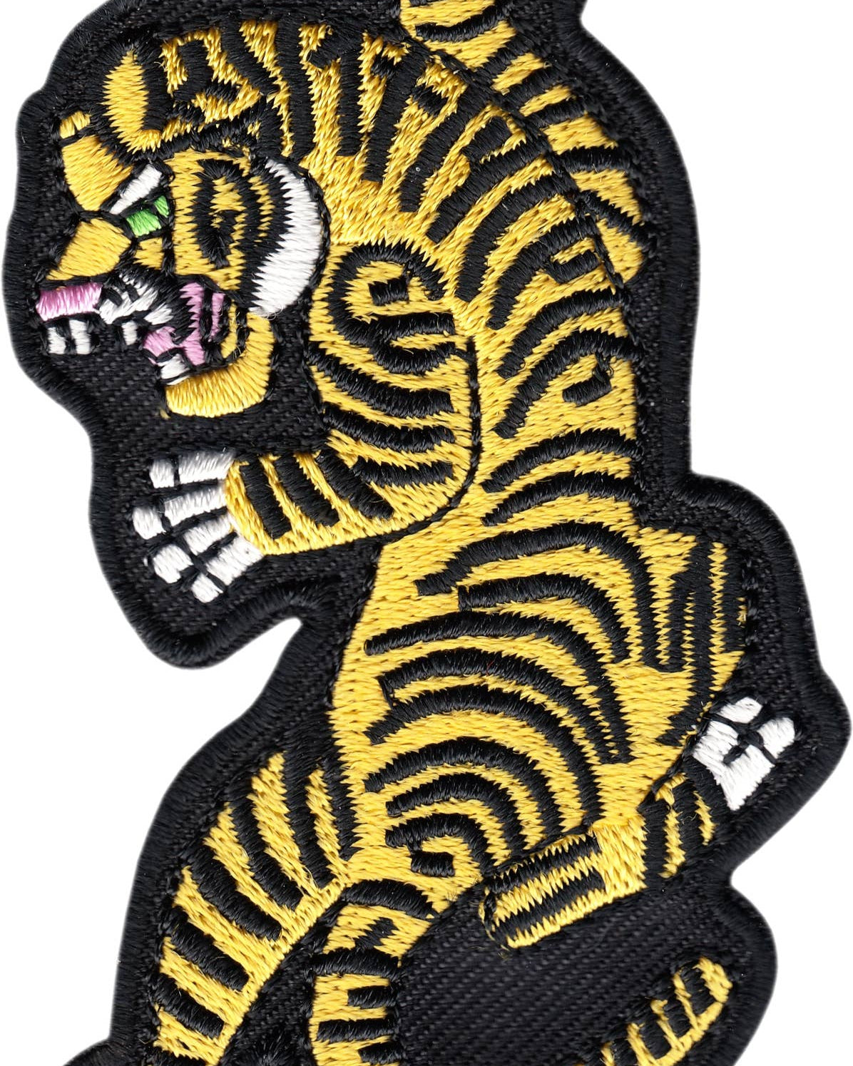 Embroidered patch of a yellow tiger on a black background