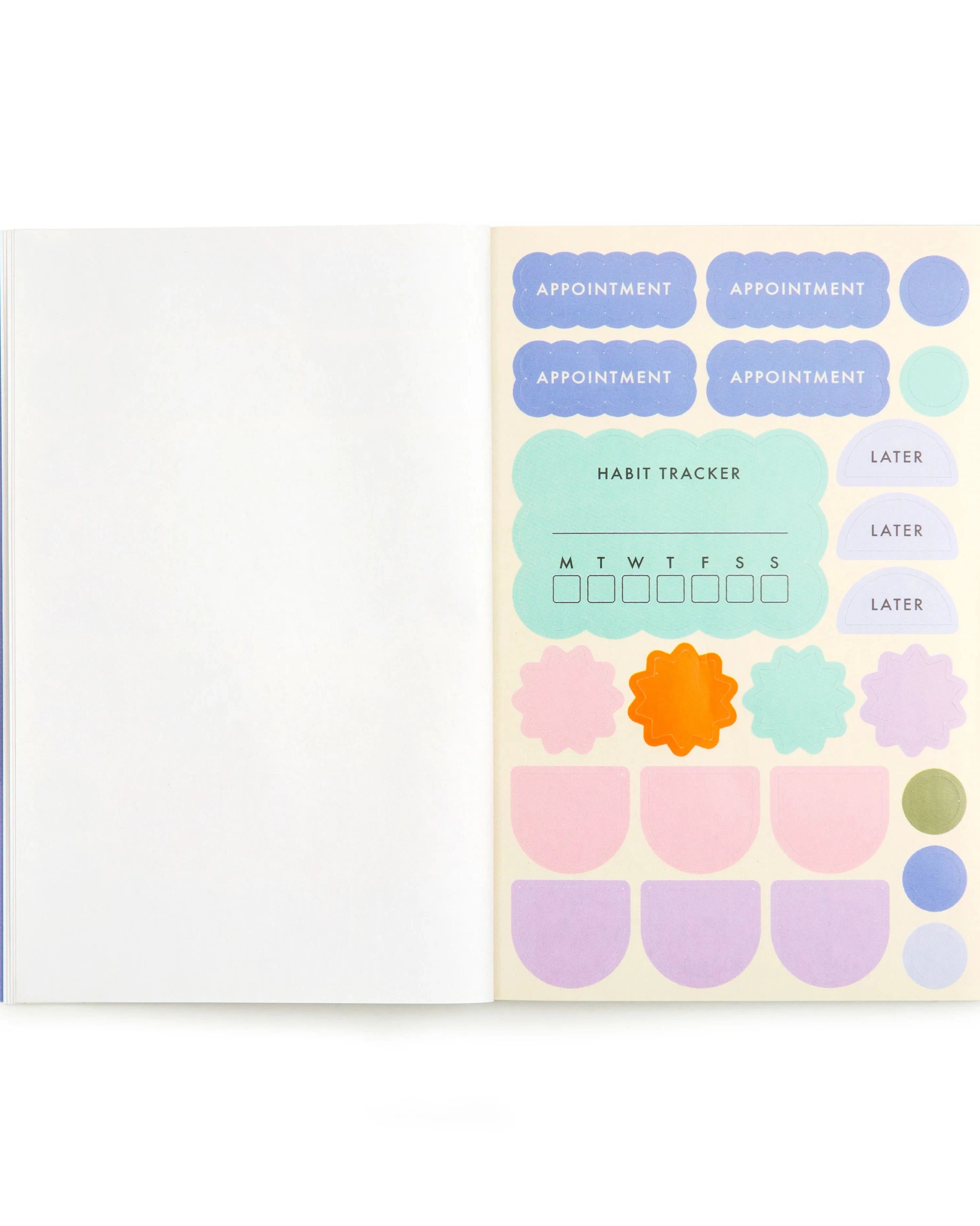 Open booklet of colorful stickers for planner