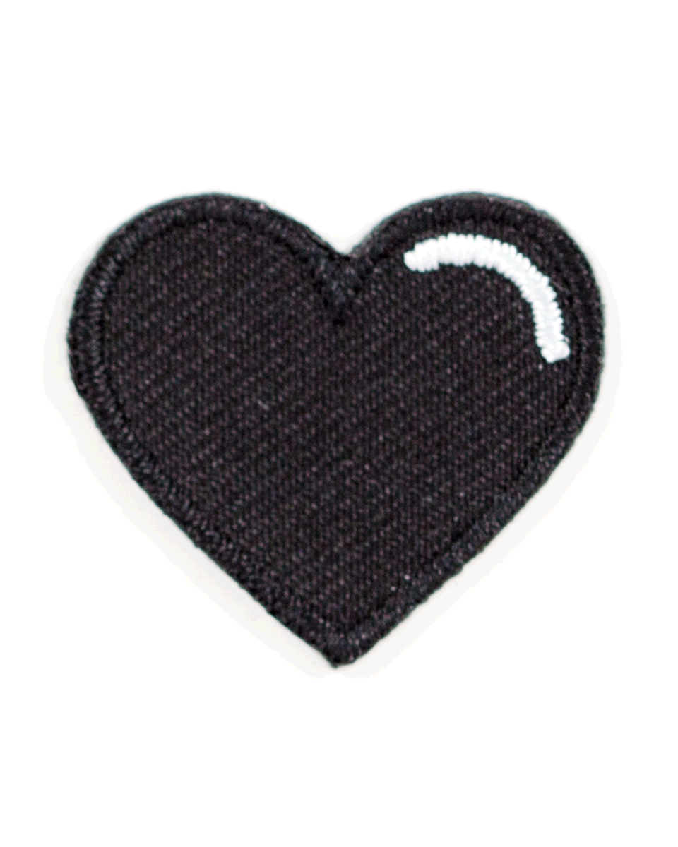 Black heart-shaped patch on a white background