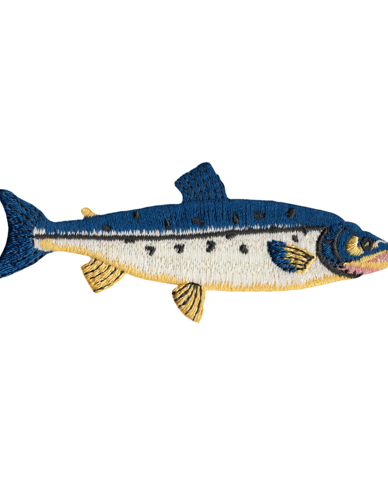 Embroidered fish patch with blue, yellow, and white colors on a white background