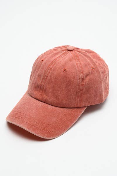 Pink baseball cap on a white background