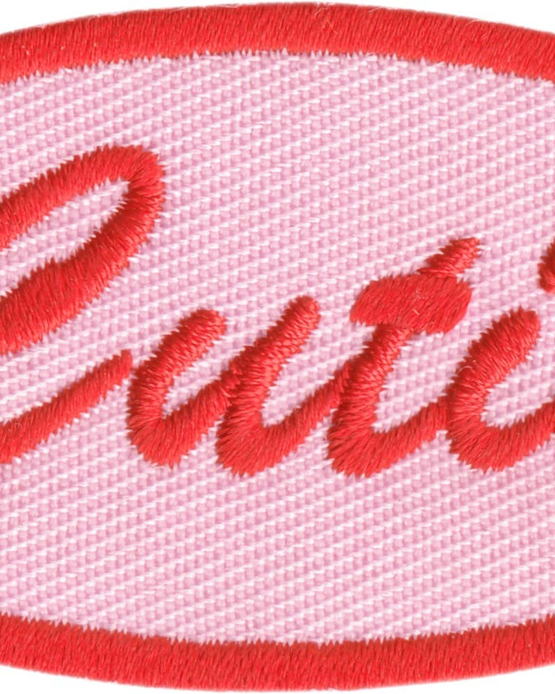 Embroidered patch with 'Cutie' text on a pink background