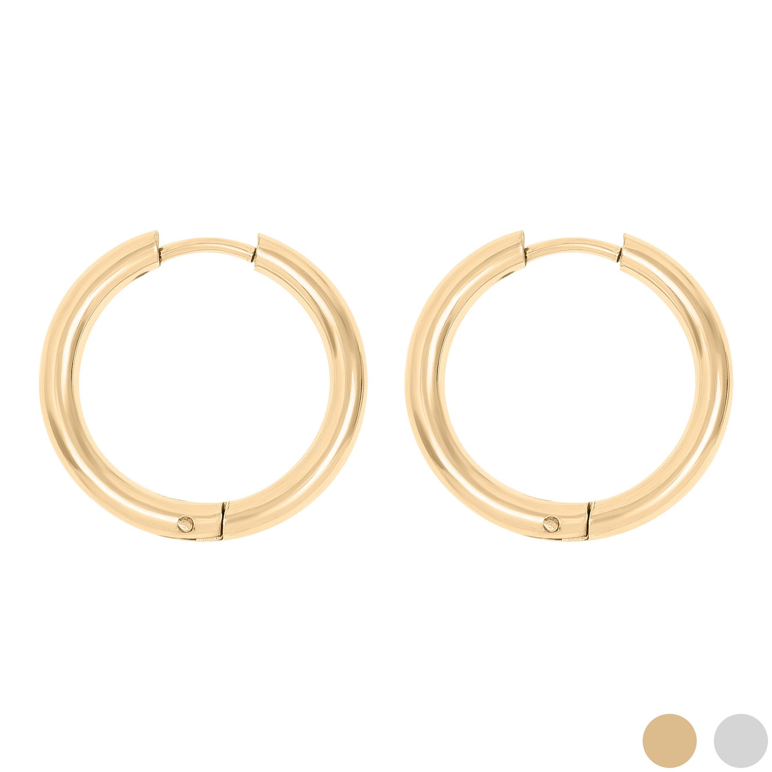 Pair of gold hoop earrings on a white background