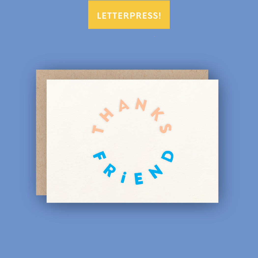 Greeting card with the words “thanks friend“ printed in a circle on front