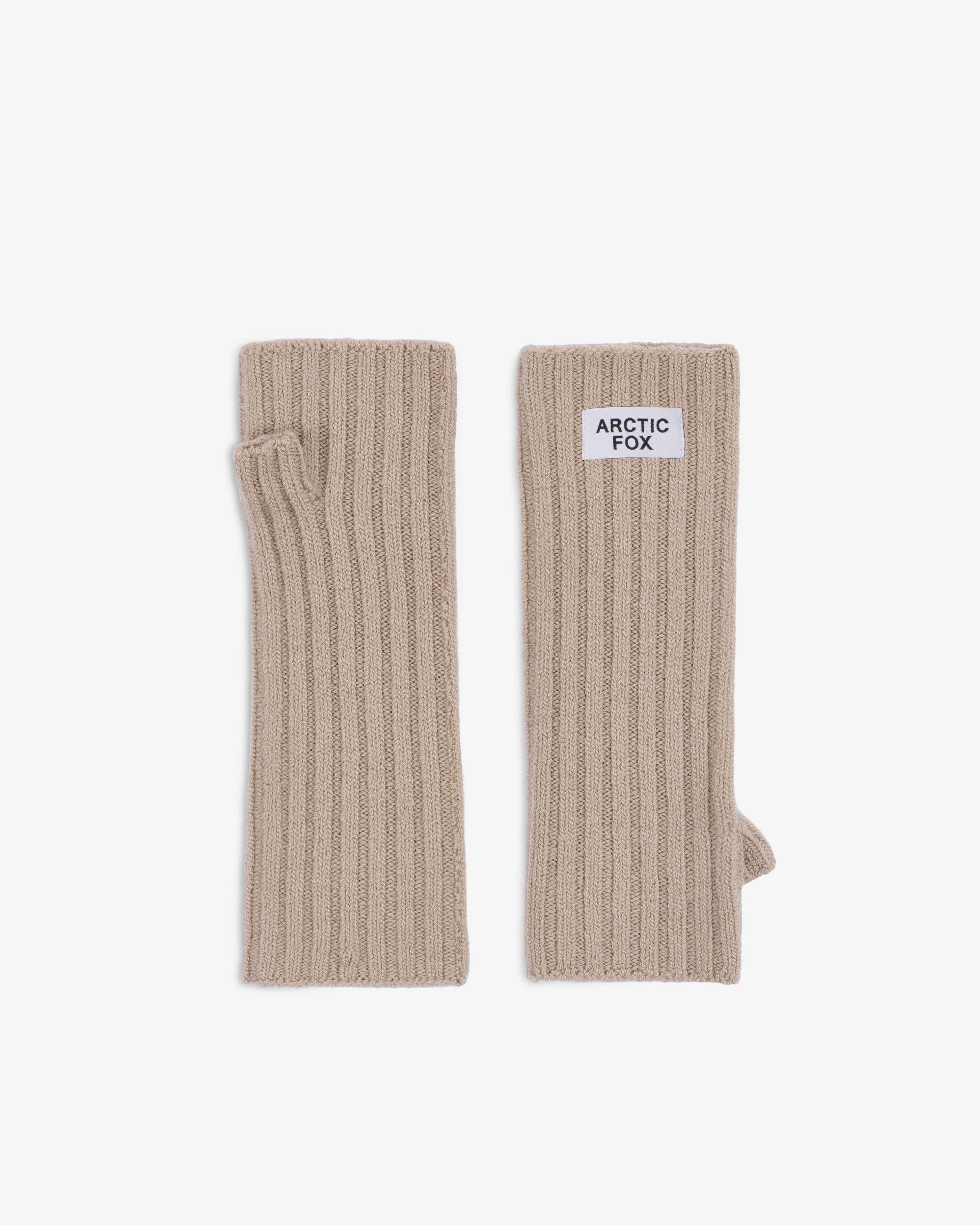 Pair of beige ribbed arm warmers with a brand label on a white background