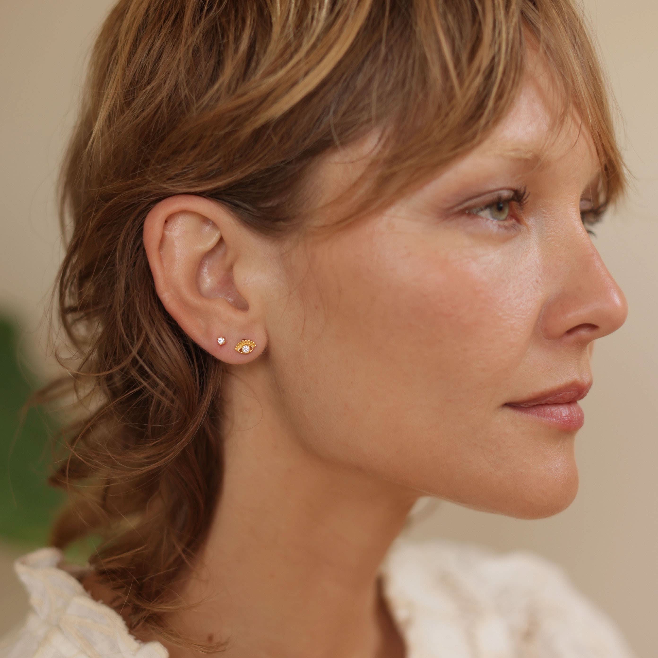 amano studios wearing crystal eye of protection gold stud