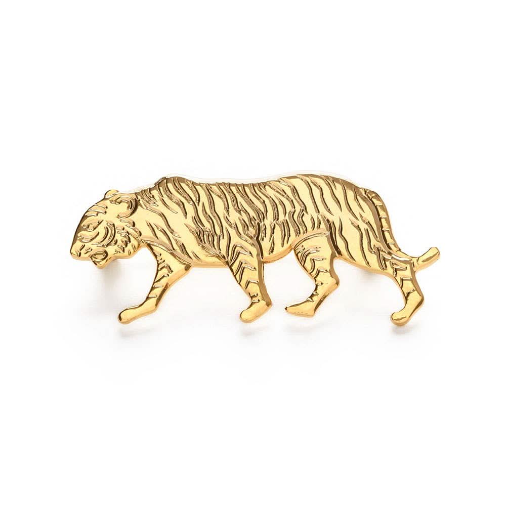 cool gold tiger broch on white background