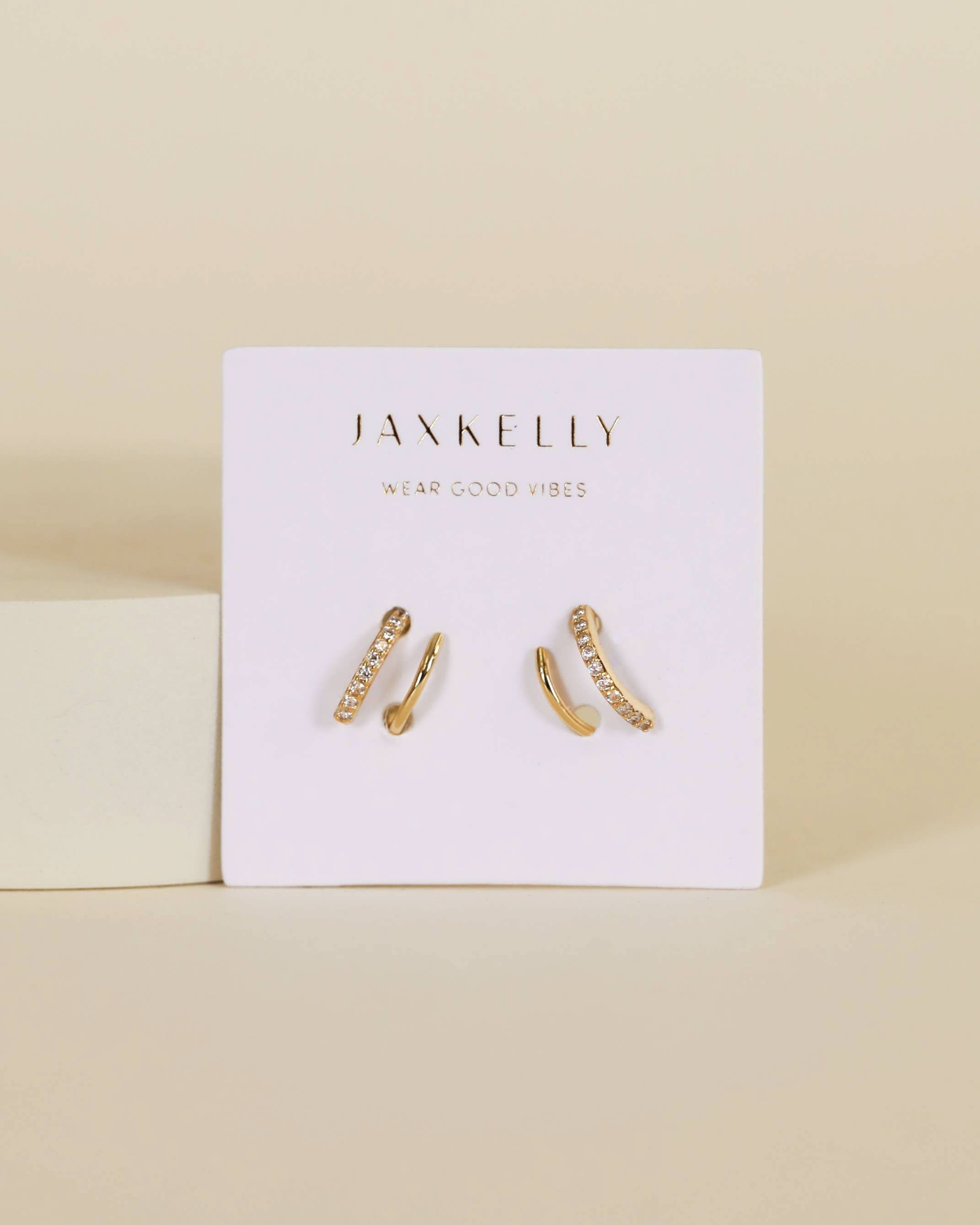Gold pave spiral earrings from Jaxkelly