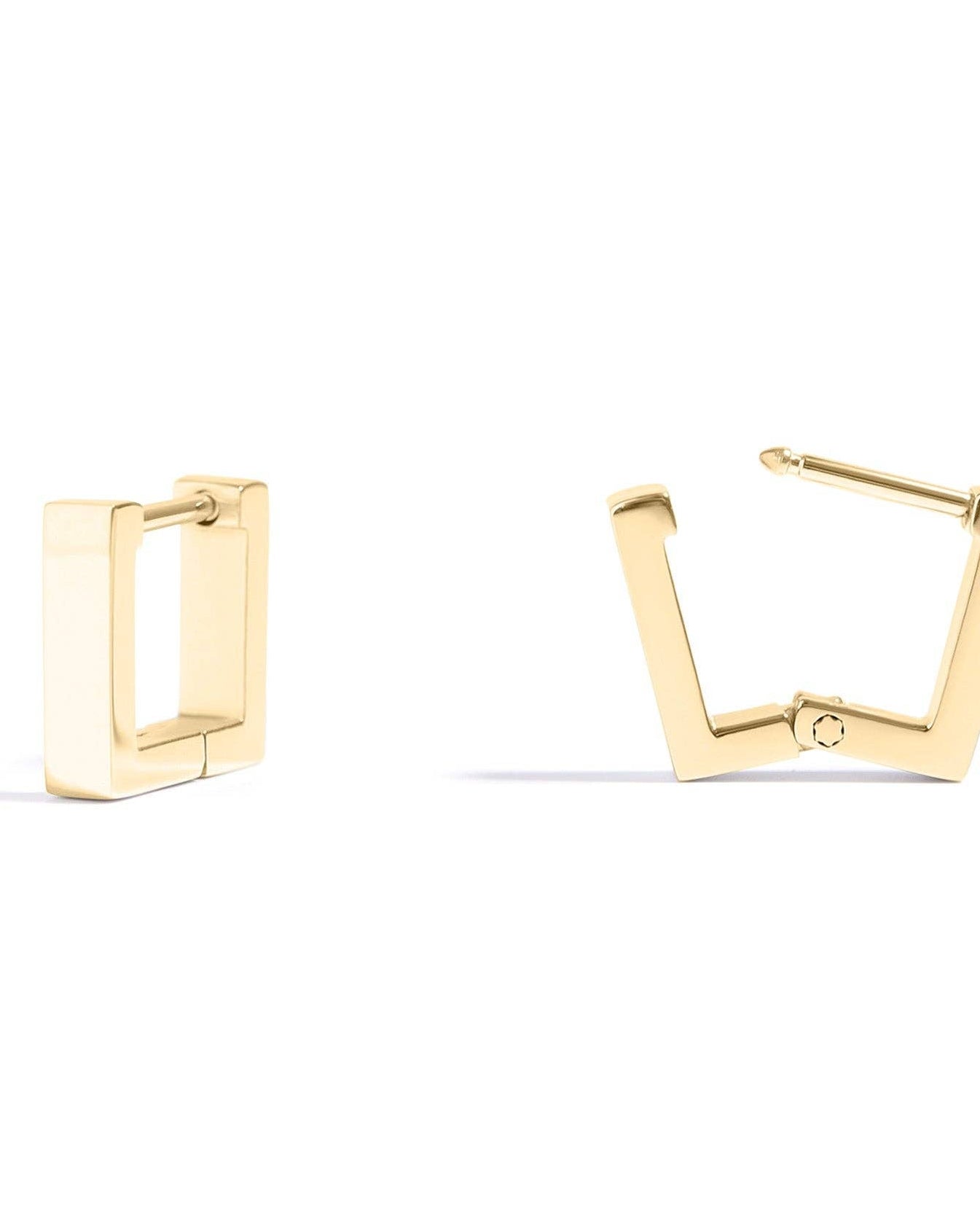 Gold hoop earrings on a white background