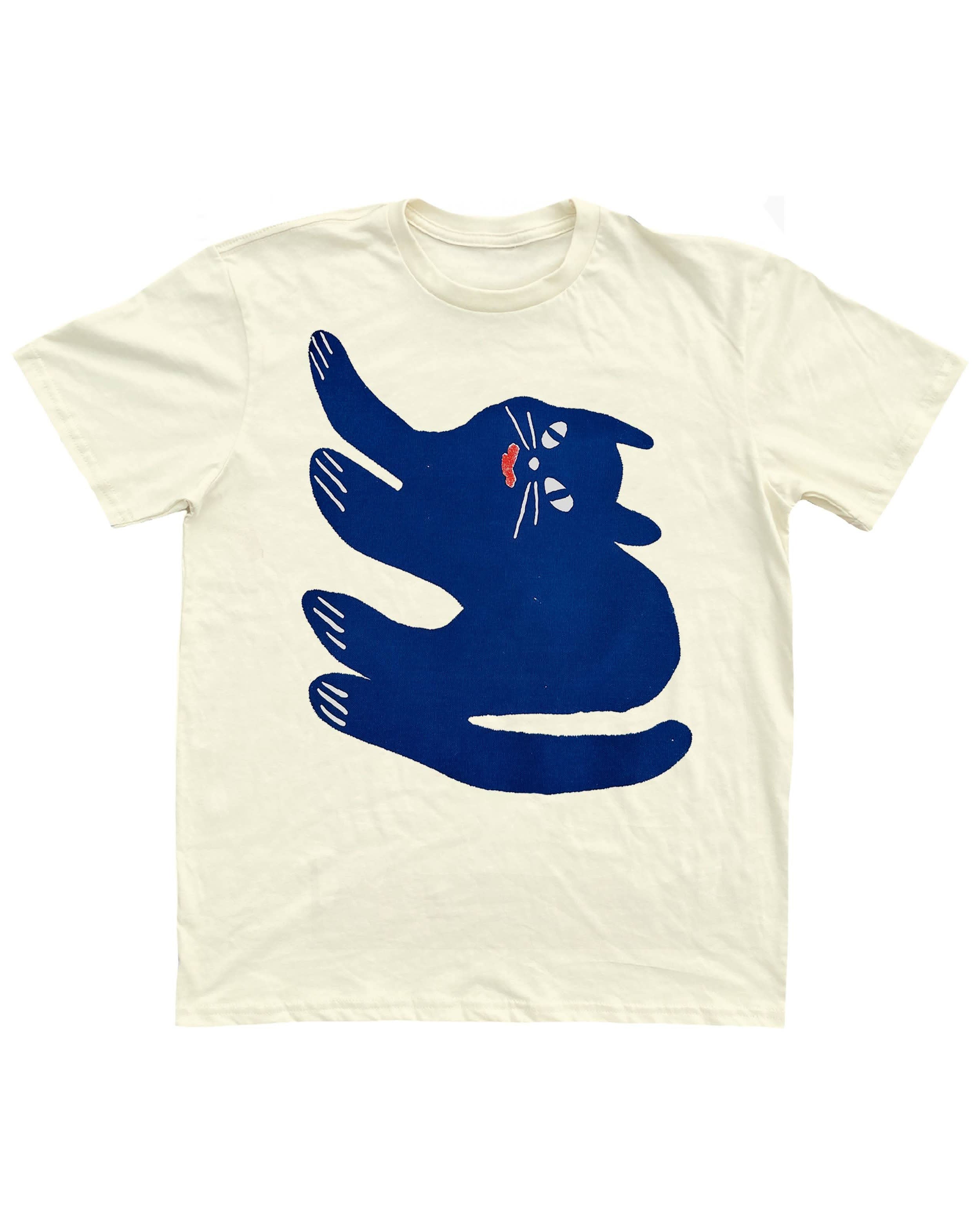 Cream white Tshirt tee with blue sideways smiling cat doodle