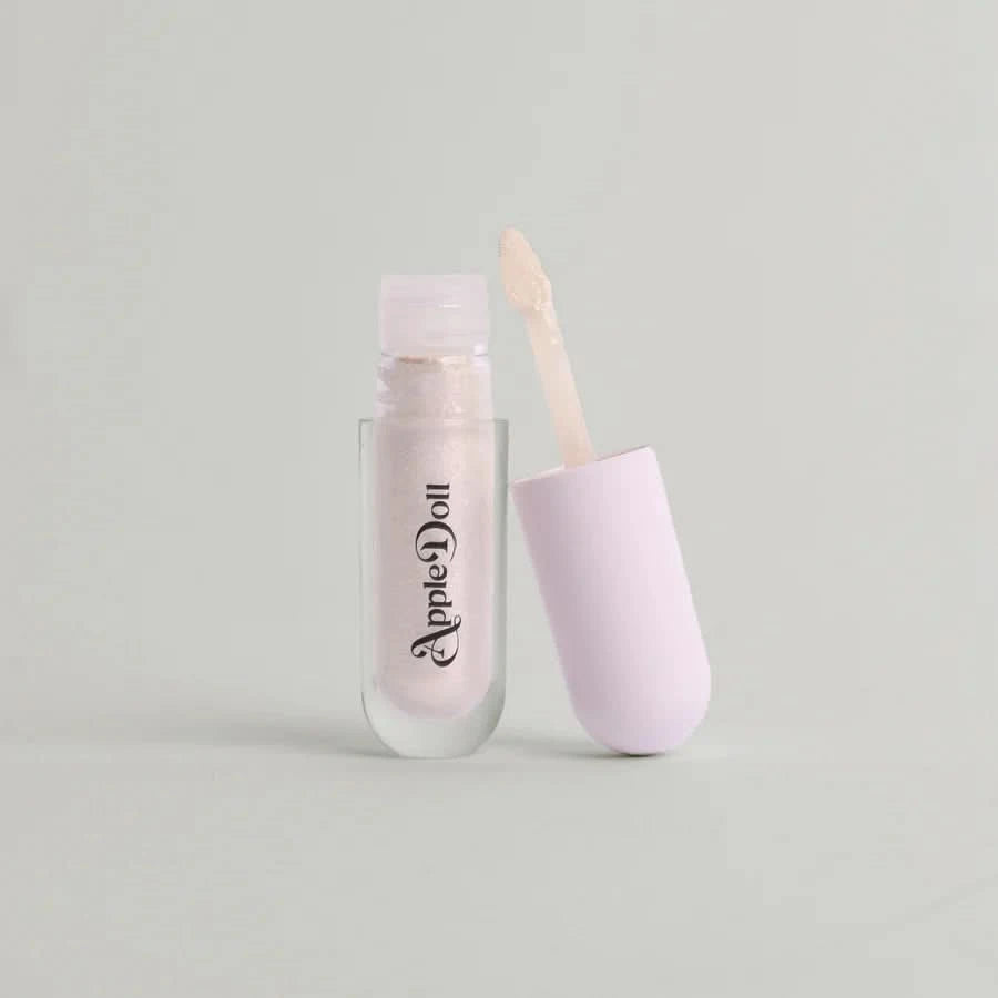 Open tube of AppleDoll Cosmic Aphrodite Crème Shadow pearlescent, shimmering.