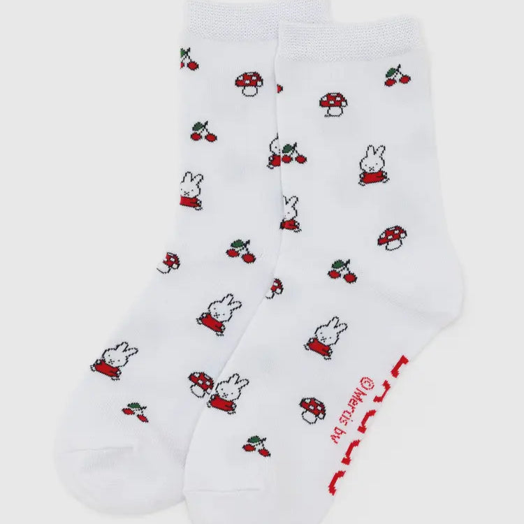 White socks with red and black designs on a white background