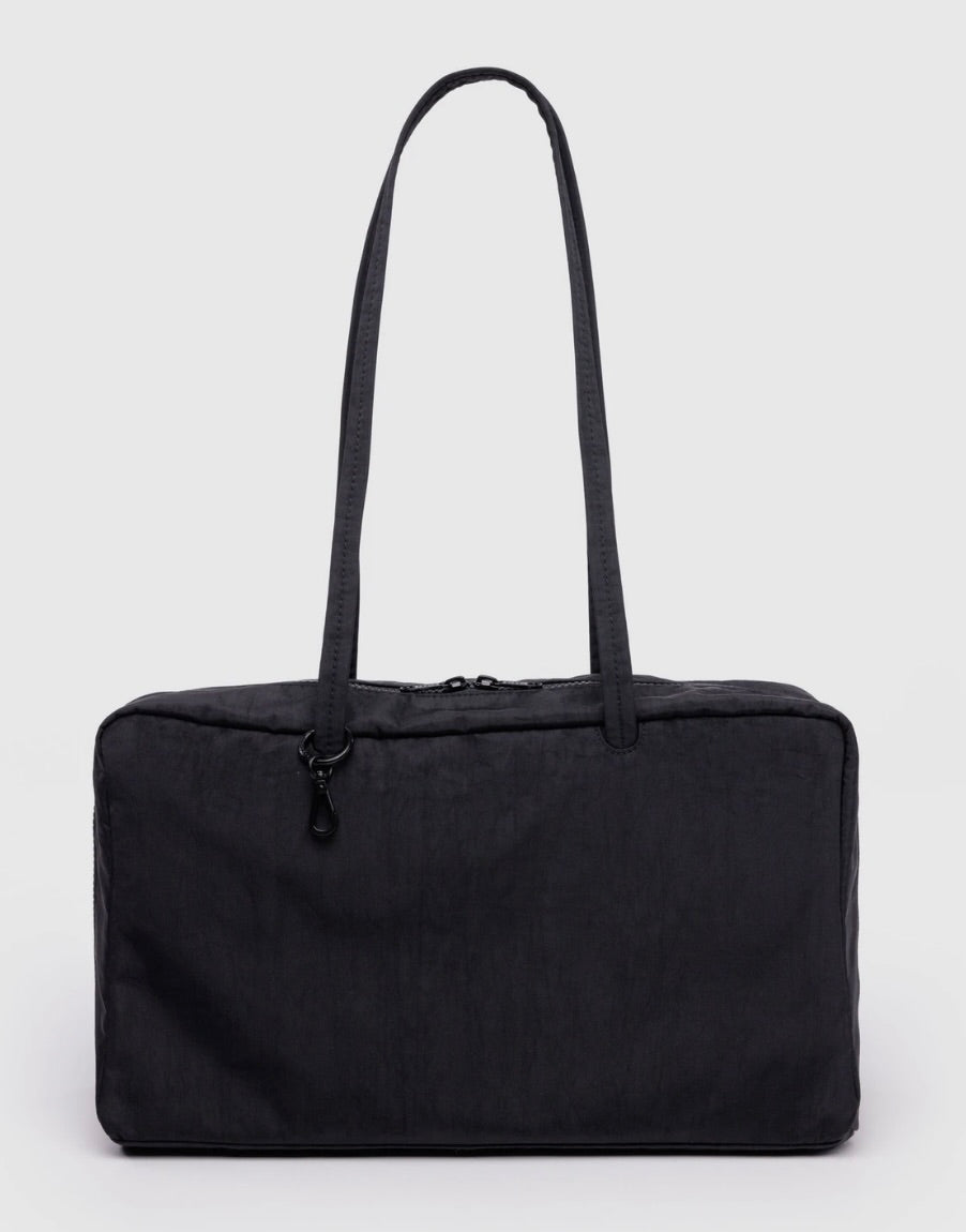 Black BAGGU Medium Nylon Bowler Bag with long handles.