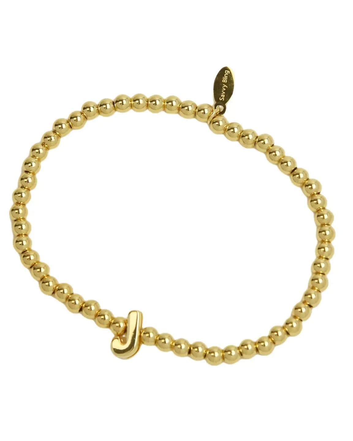 Gold beaded bracelet with a small gold clasp on a white background