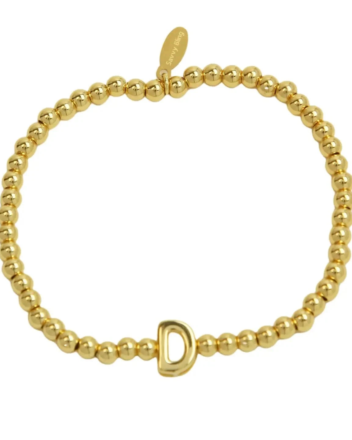 Gold beaded bracelet with a clasp on a white background