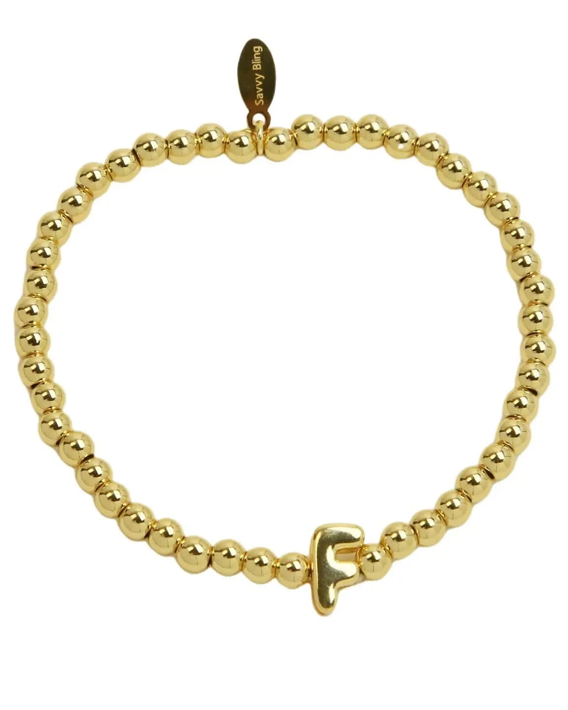 Gold beaded bracelet with a clasp on a white background