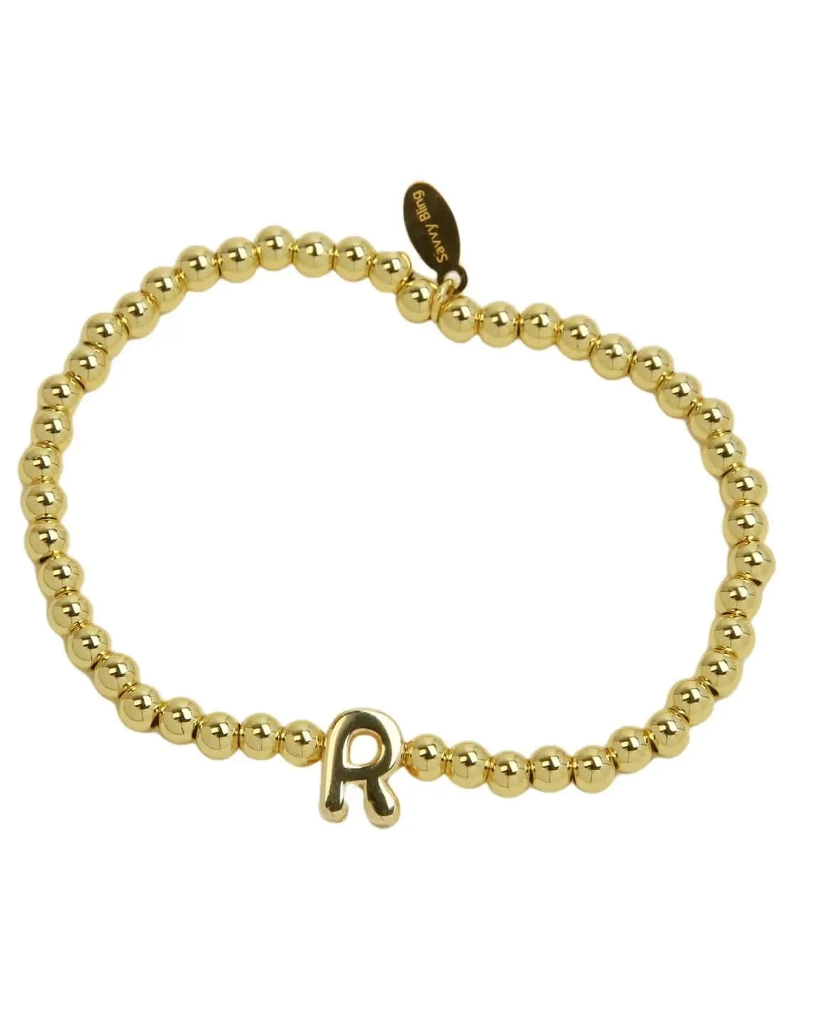 Gold beaded bracelet with a letter 'R' charm on a white background