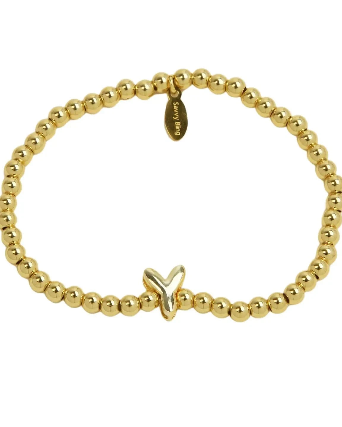 Gold beaded bracelet with a butterfly charm on a white background