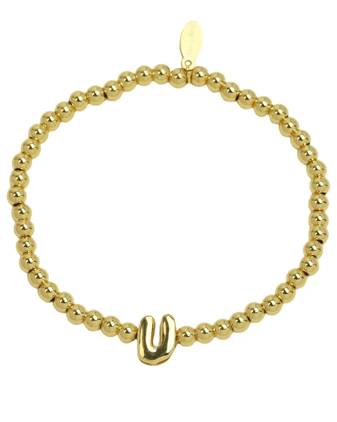 Gold beaded bracelet with a unique clasp on a white background