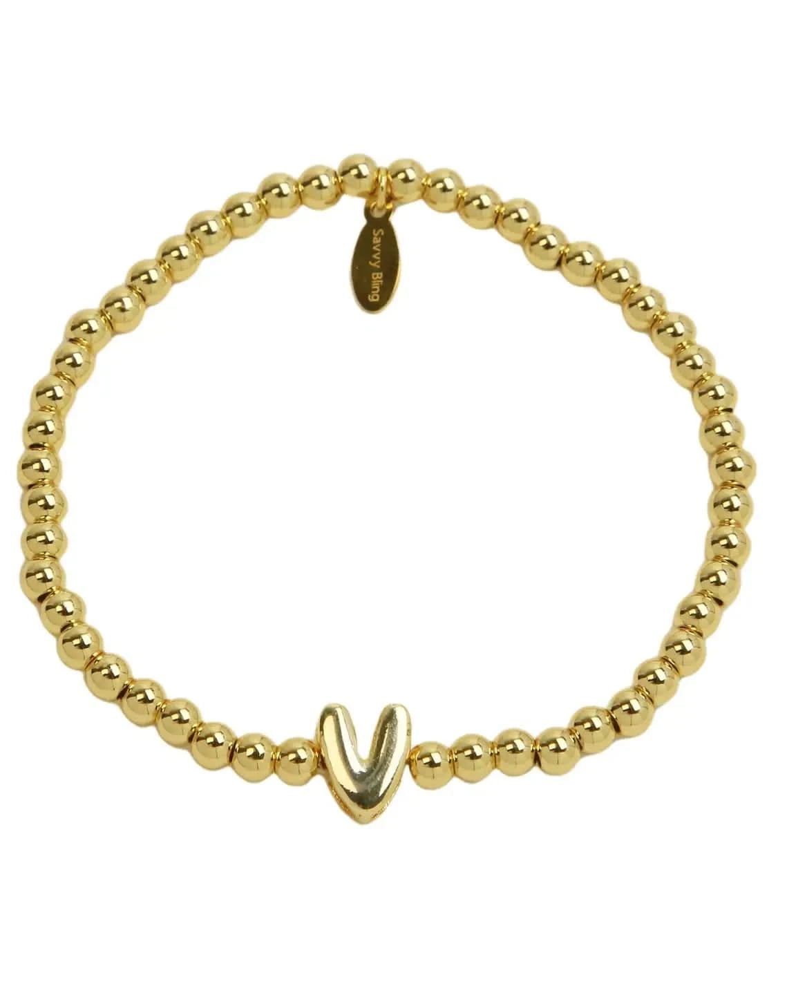 Gold beaded bracelet with a unique clasp on a white background