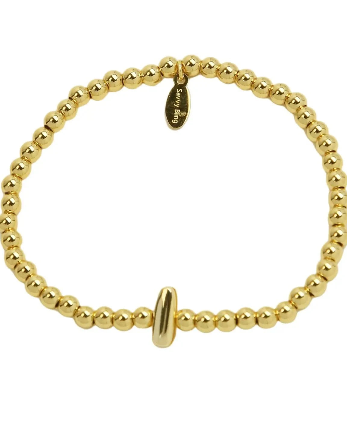 Gold beaded bracelet on a white background