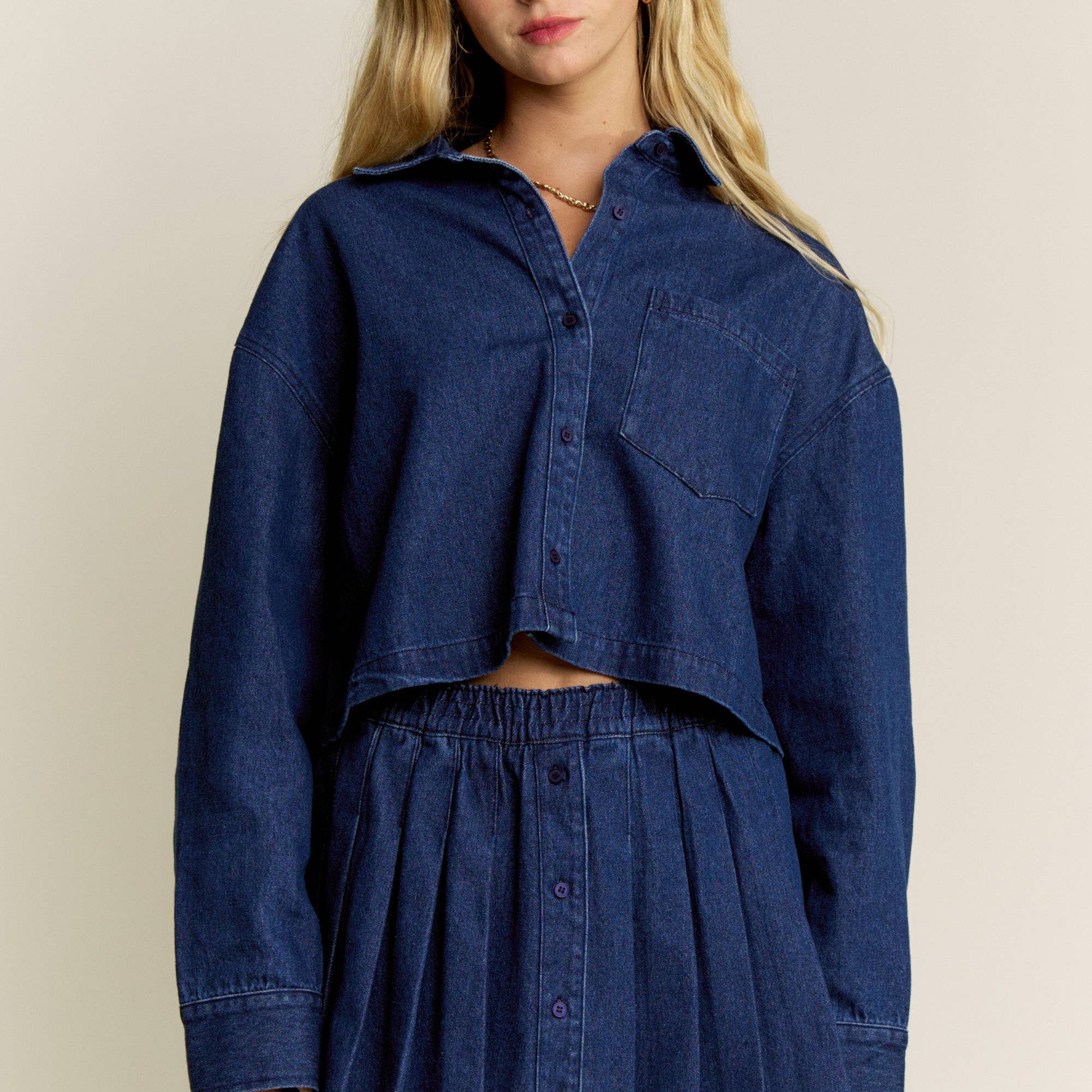 classic denim look, this pleated skort combines the style of a mini skirt