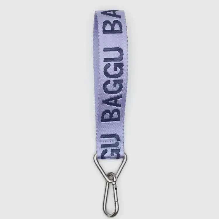 Purple baggu strap with metal clip on a white background