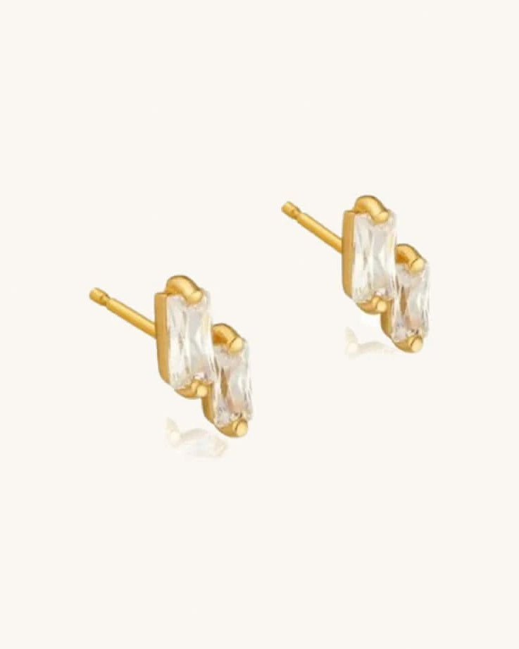 Gold earrings with clear gemstones shine pair