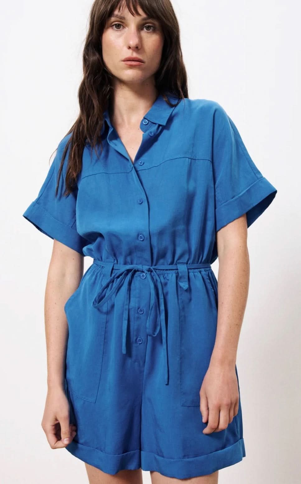 Lily Jumpsuit features short sleeves with lapels blue color