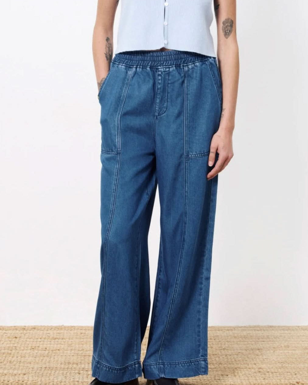 Close-up of FRNCH Marine Pants – Lightweight Navy Fabric and Side Pocket Detail