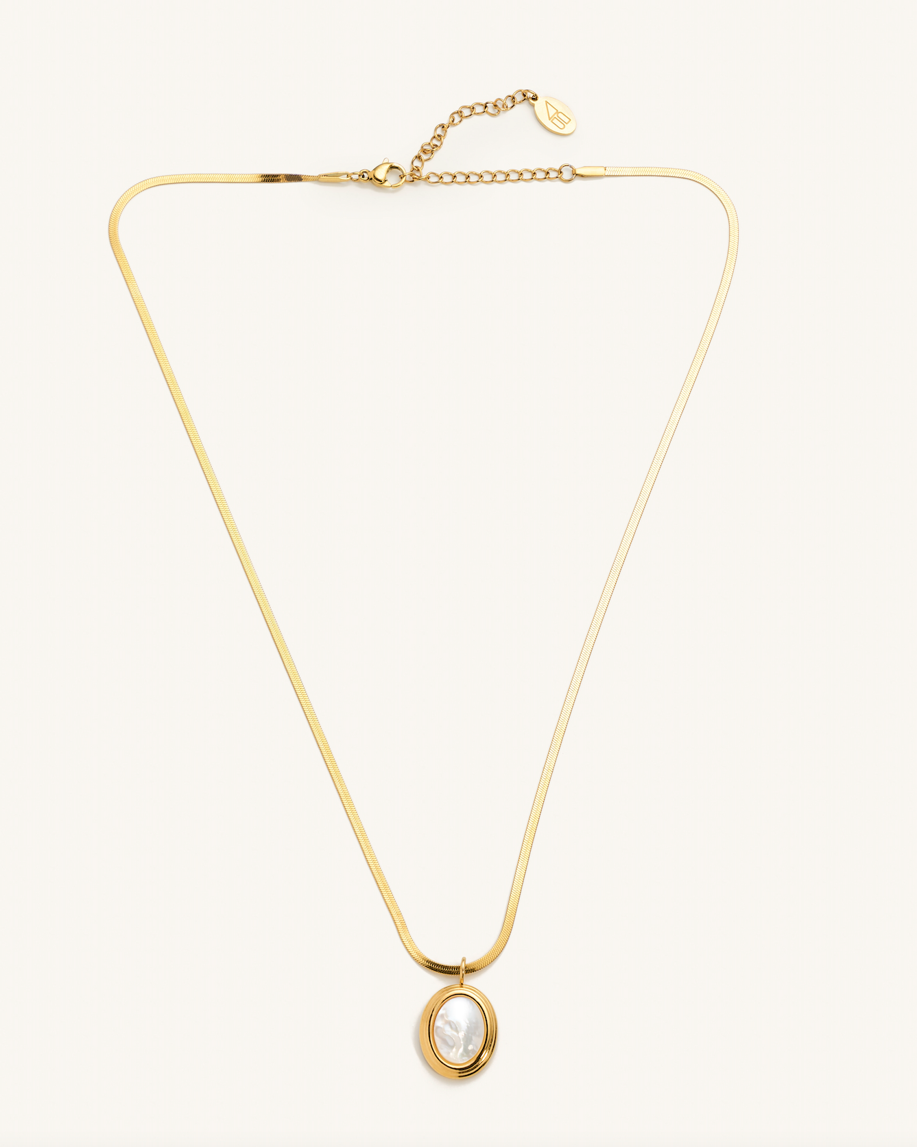 Gold pearl shell necklace with thin herringbone chain