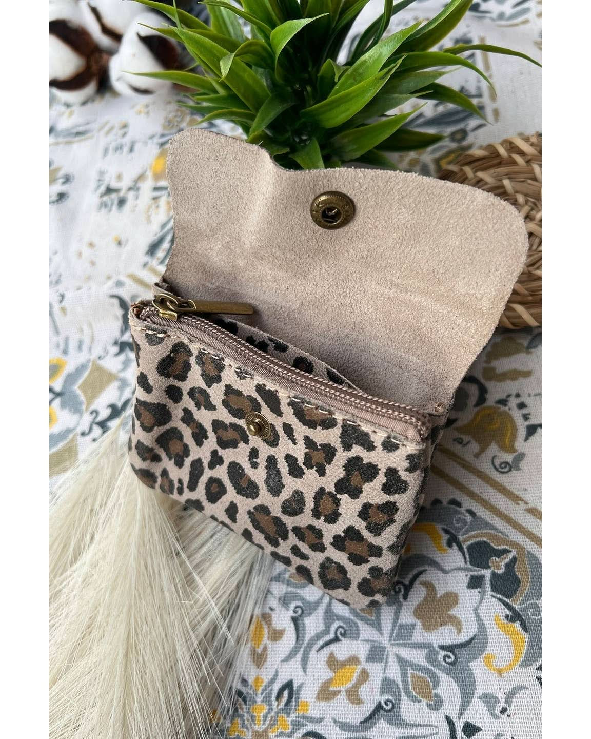 Open view of Small taupe leopard print metal wallet with over flap and gold button clasp