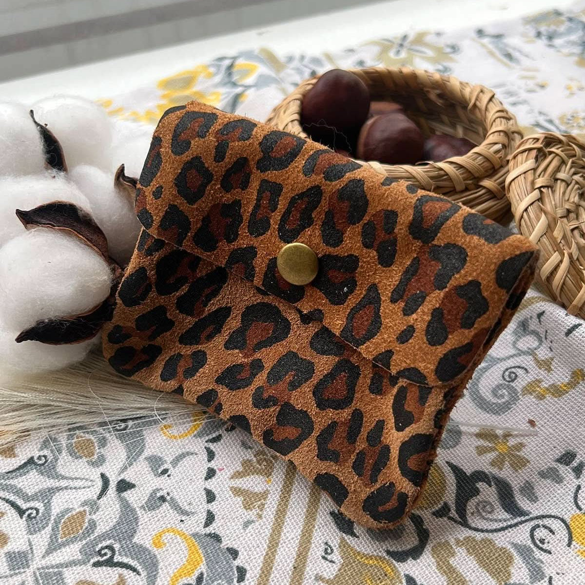 Chestnut brown leopard wallet with metal button clasp