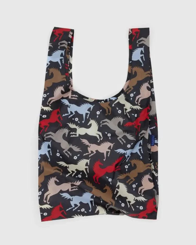 Dark grey black baby baggu reuseable bag with colorful horse cutouts throughout the print