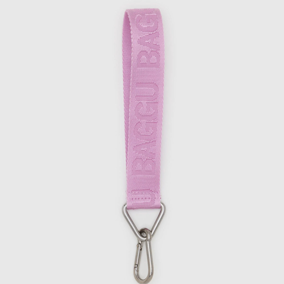 Pink fabric strap with metal clip on a white background