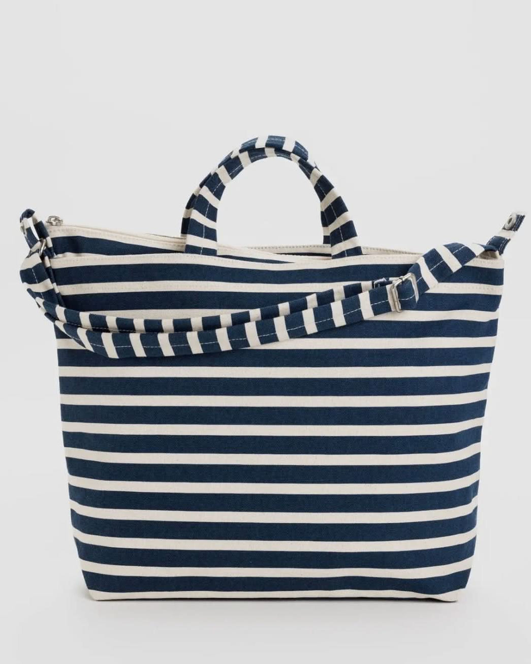 Navy and white striped tote bag on a light gray background