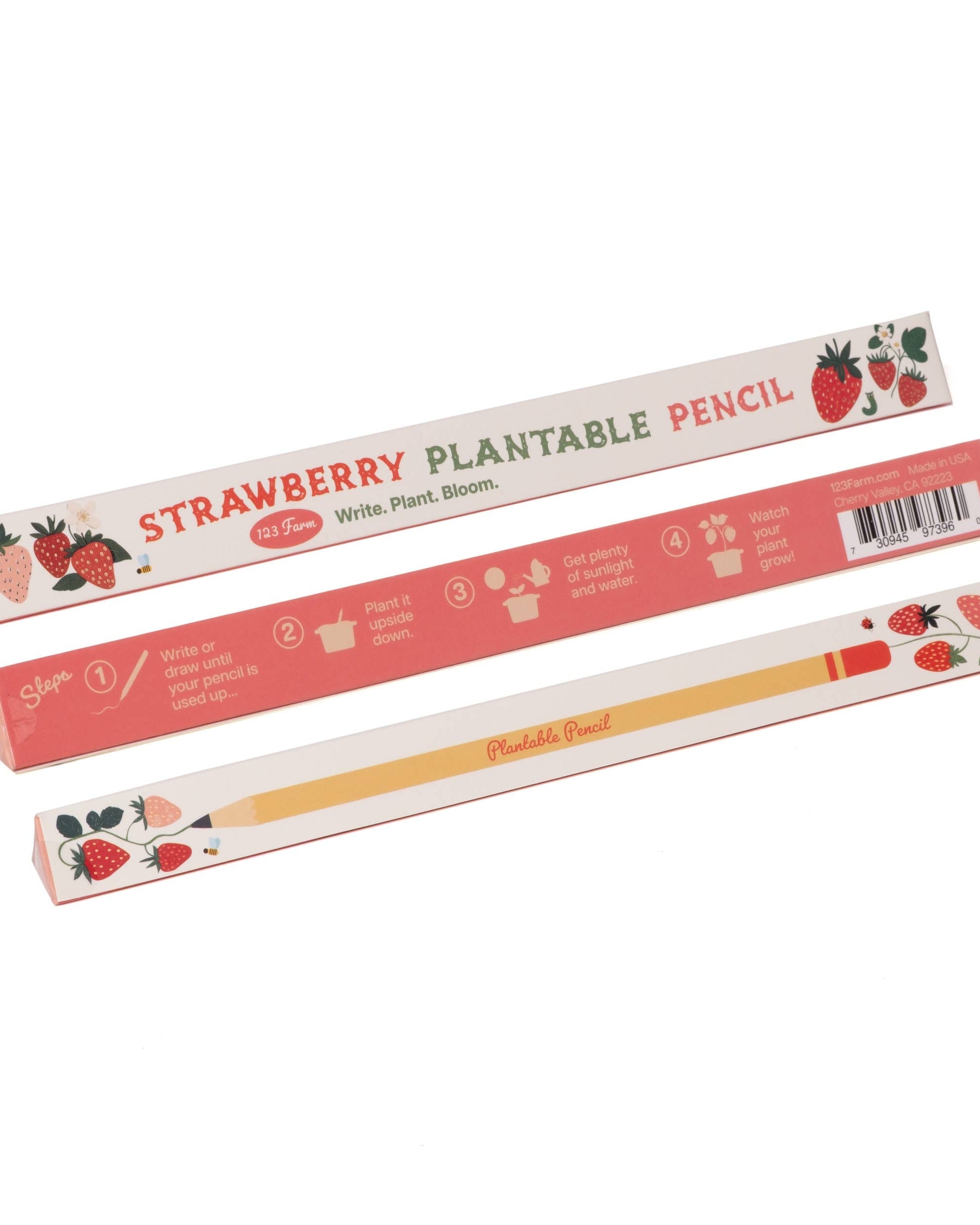 Strawberry plantable pencil with packaging on a white background