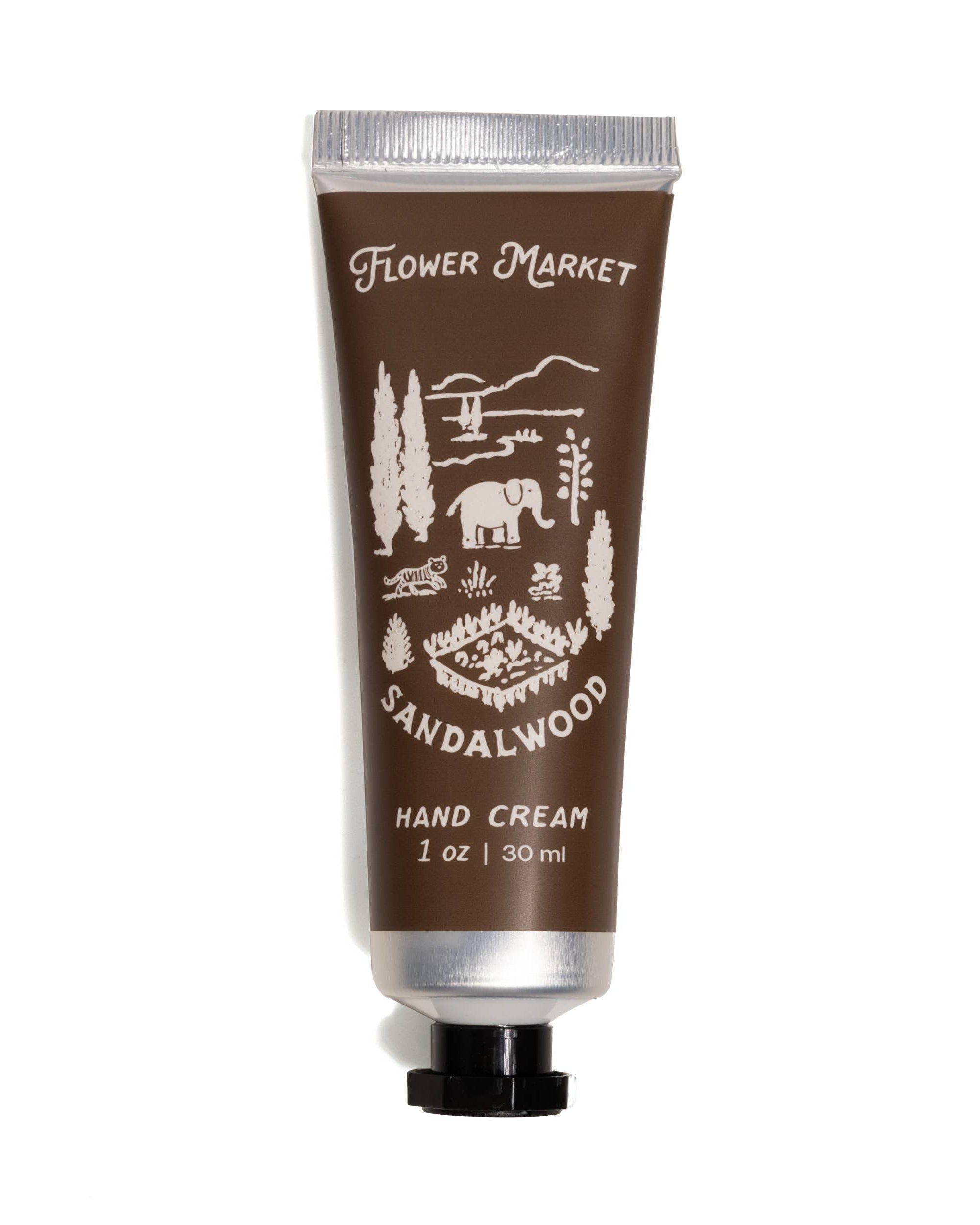Hand cream tube labeled 'Flower Market Sandalwood' on a white background