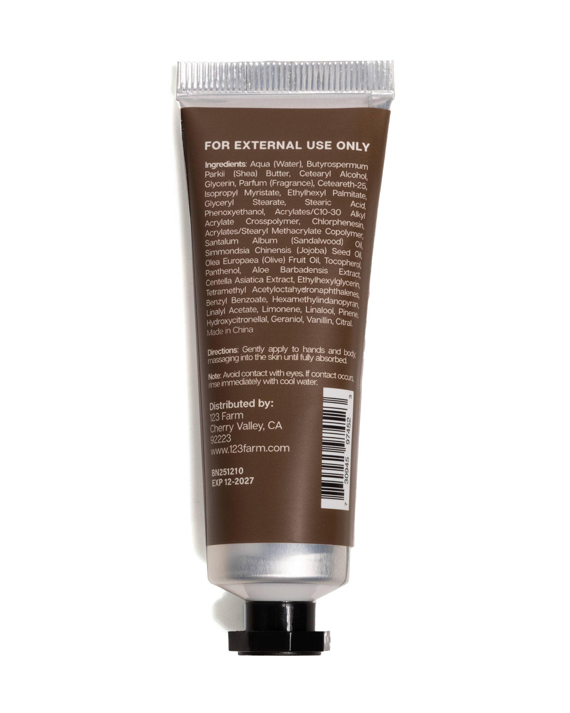 Hand cream tube with label on a white background