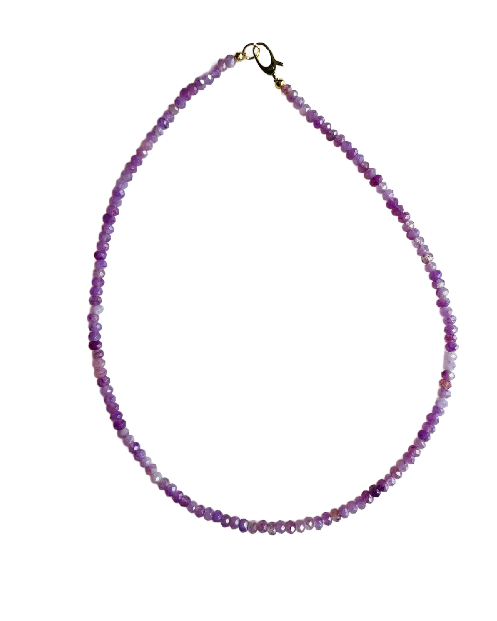 Purple beaded necklace on a white background
