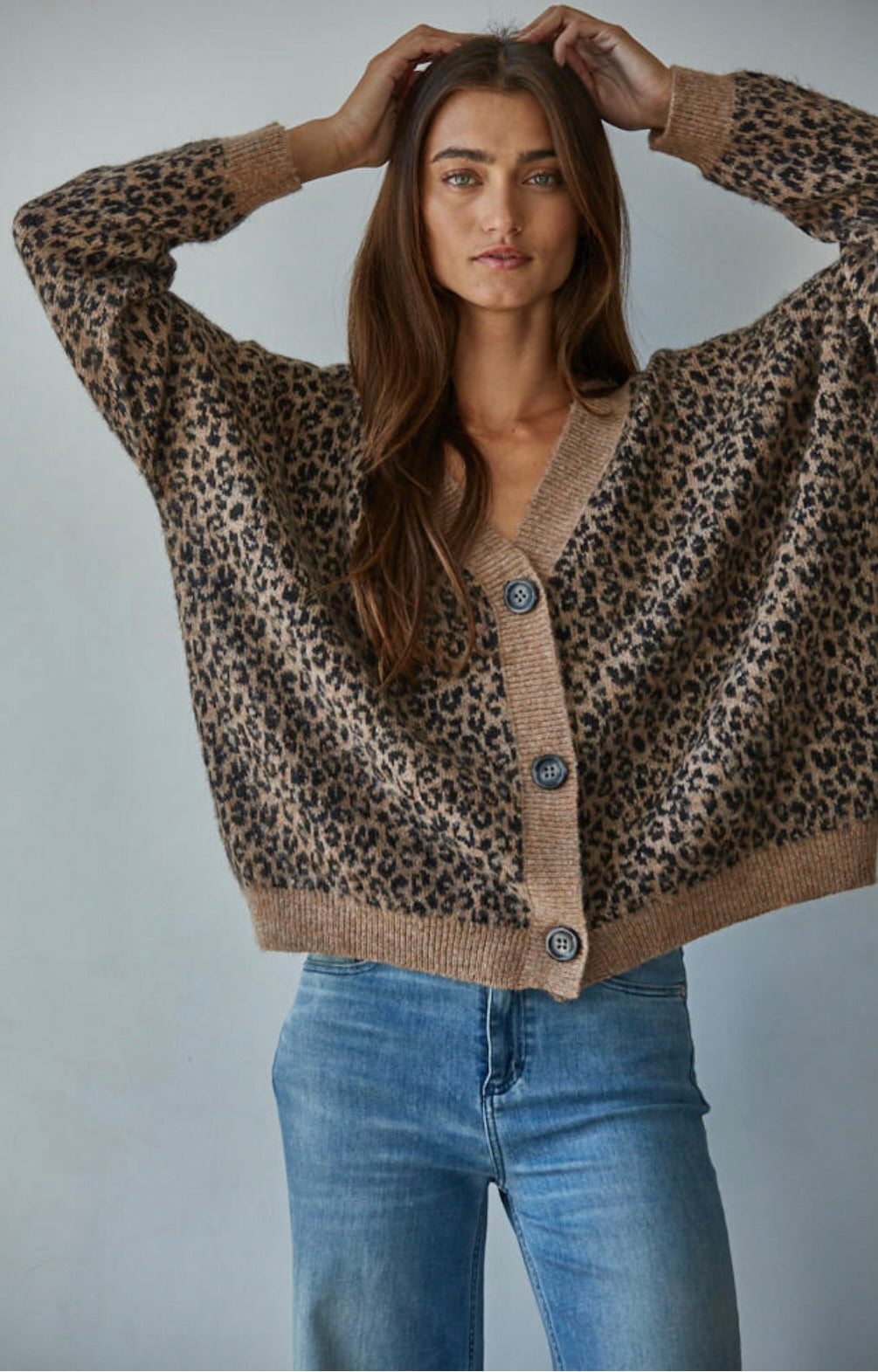 Long sleeves and a relaxed fit make it perfect for layering over your favorite tees or dresses.