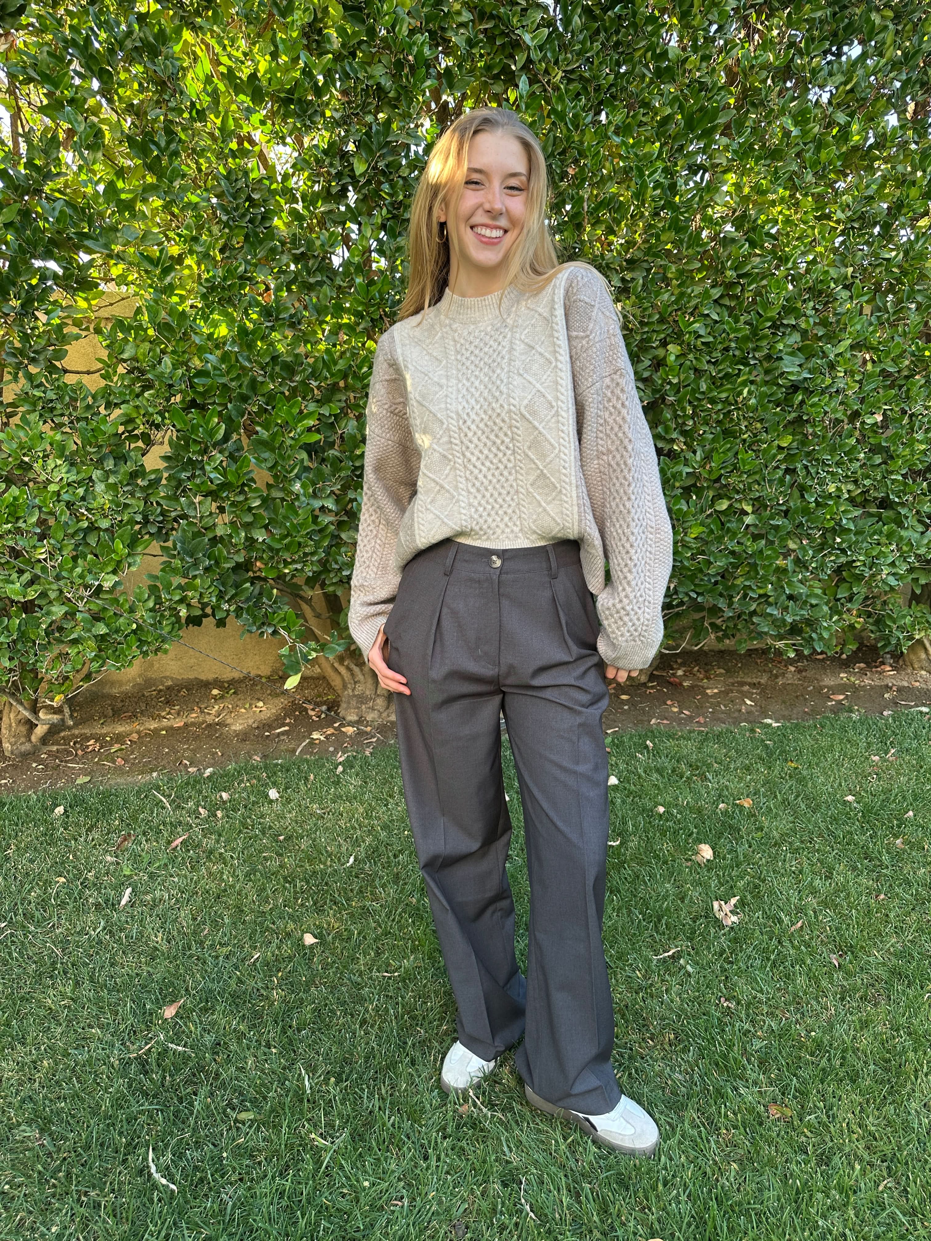 Person wearing a Gray color Trouser and standing in park