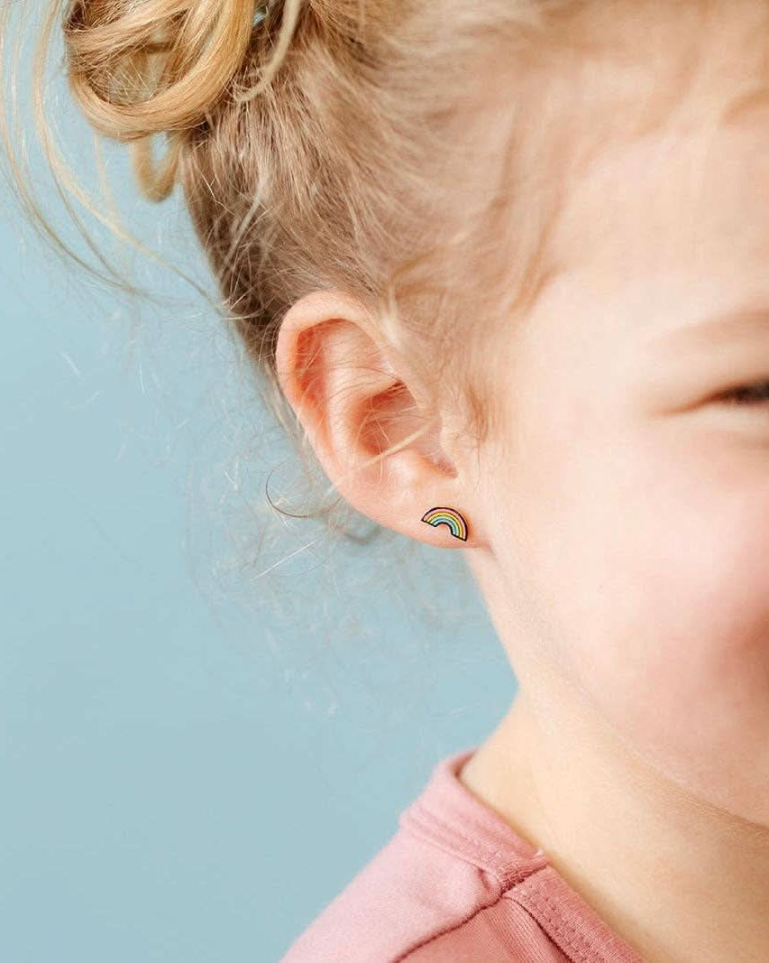 Child wearing Pair of Pastel hue rainbow flat back earrings