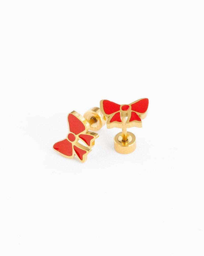 Gold bow-shaped earrings with red centers