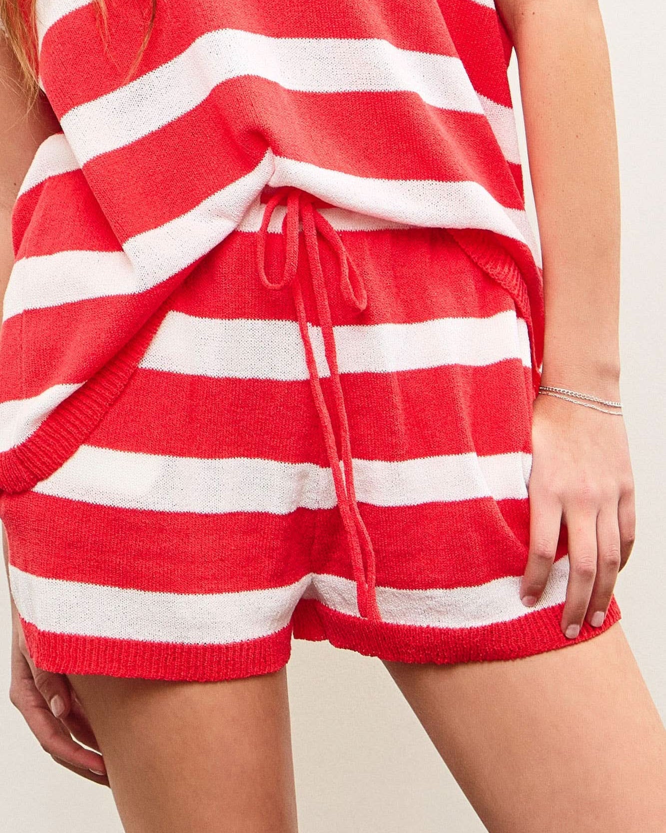 Retro Red And White Drawstring Sweater Shorts waist band and drawstring for the perfect fit.