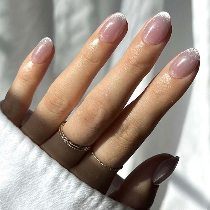 Close-up of short round press-on nails, solid color finish