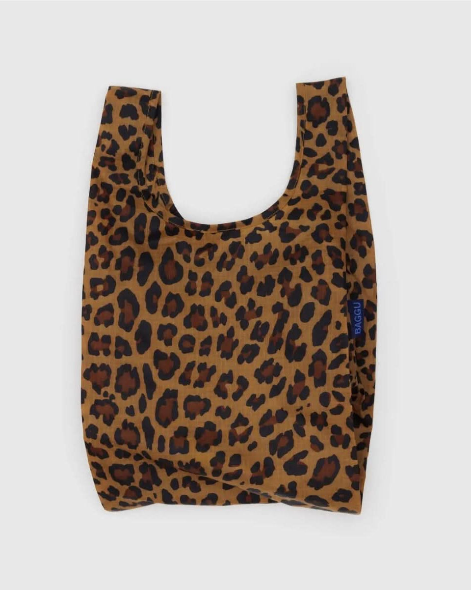 Leopard print BAGGU reusable tote, grocery bag laying flat on a white background